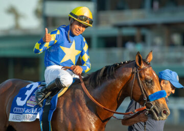 Jockey Martin Garcia guides Citizen Bull to the winner's circle