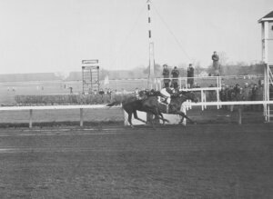 Olympia, Eddie Arcaro up, Palestinian (Woodhouse up), winning Wood Memorial, Jamaica, on April 24, 1948.